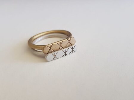 Brass and Silver Star signet rings as stack rings