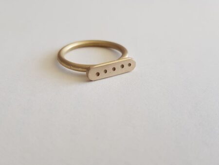 Brass round wire signet ring with letter punched dots