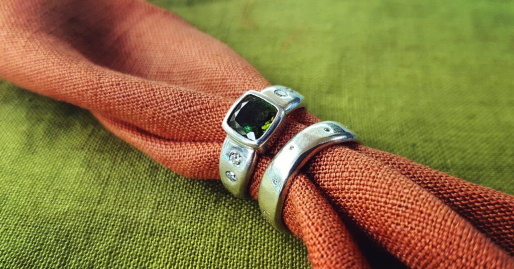 Green Tourmaline and diamond engagement and wedding ring combo