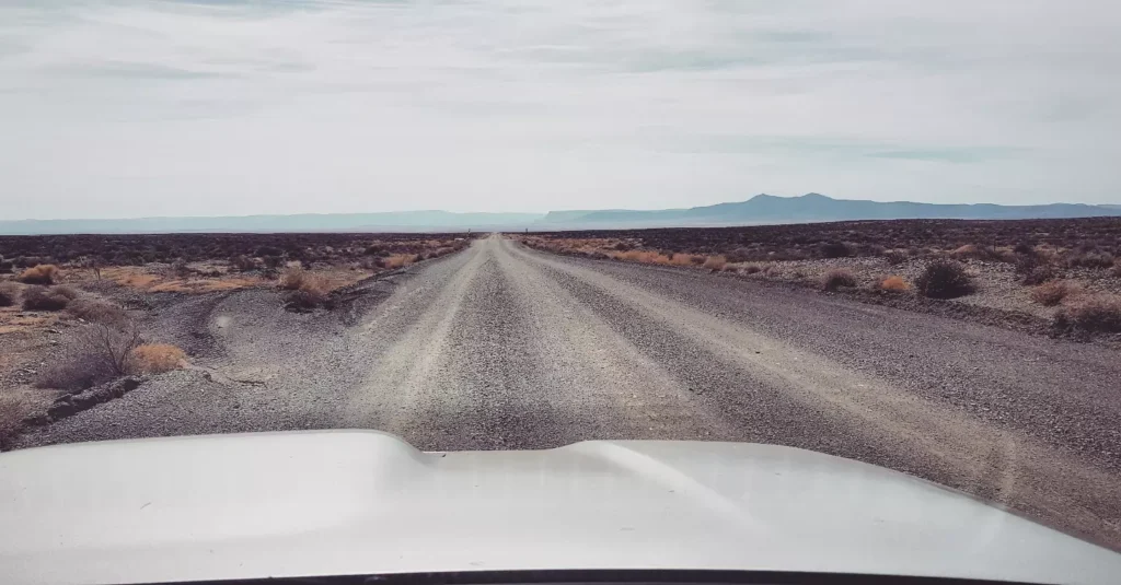 Car  bonnet pointing into the Tankwa Karoo National Park