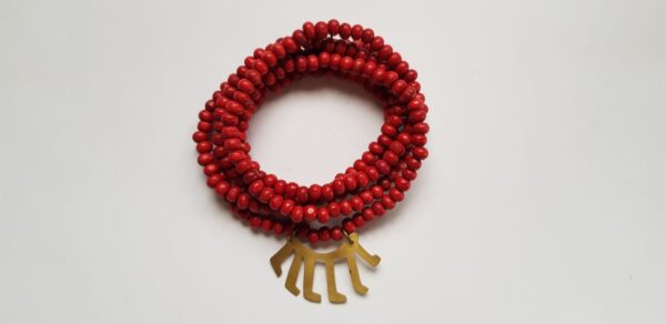 Red dyed wood bead necklace with brass Malawi kids drawn symbol