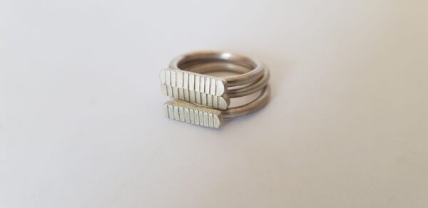 Trio of silver striped signet rings by Stefni