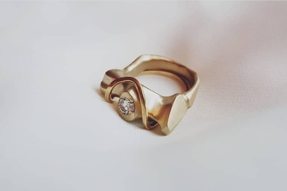 Custom made ring with family diamond
