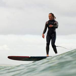 Portrait of Stefni Muller Surfing
